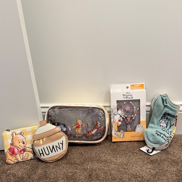 Disney Handbags - Disney Winnie the Pooh bioworld 3 piece makeup set jewelry socks NWT